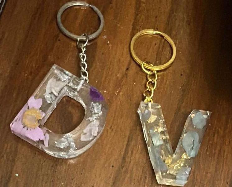 Keychains and heart pictures with designs  you can choose any color and design you like